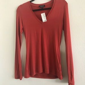 Bebe Long sleeve V-neck shirt